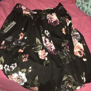 A black flower skirt
